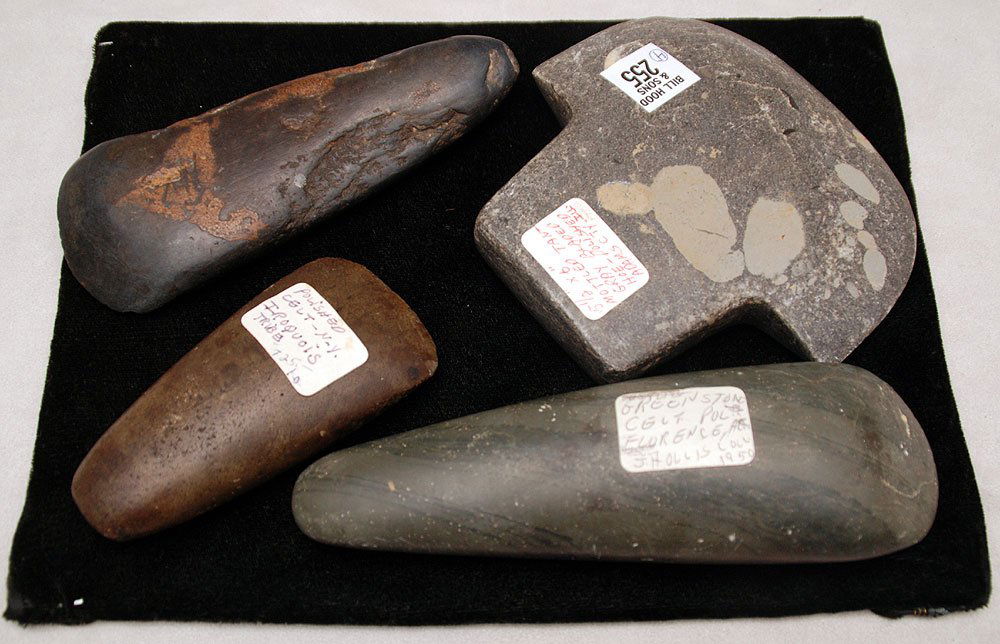 4 Old Stone implements, 2 Iraquoi axe heads, bladed hoe: 4 Old Stone implements, 2 Iraquoi axe heads, bladed hoe, found in Adams City, Illinois