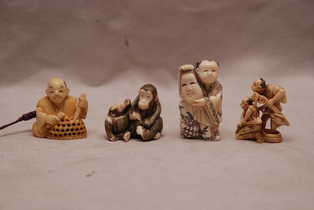 4 signed ivory netsukes, 1 3/8"h to 2"h: 4 signed ivory netsukes, 1 3/8"h to 2"h