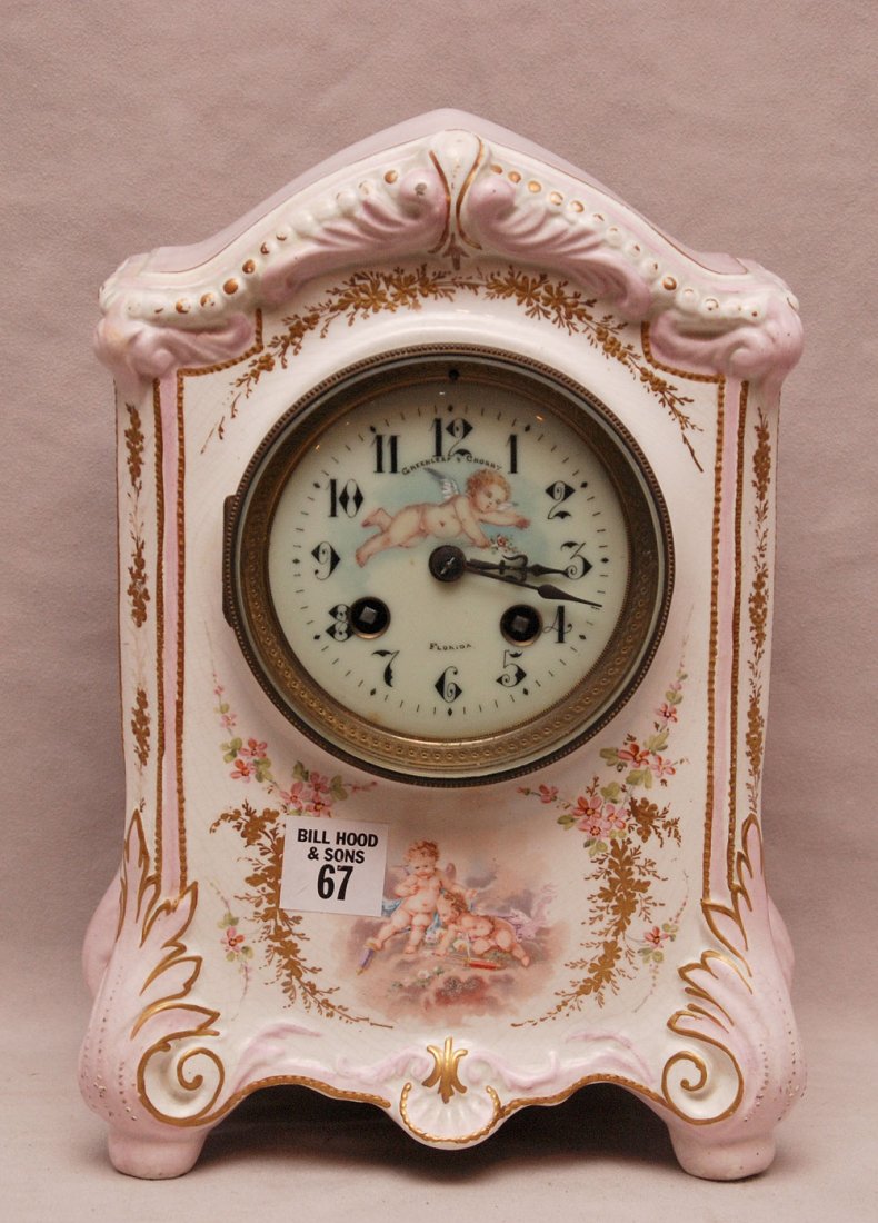 China ware mantle clock with French movement, angel: China ware mantle clock with French movement, angel motif, 10 1/2"h x 7"w