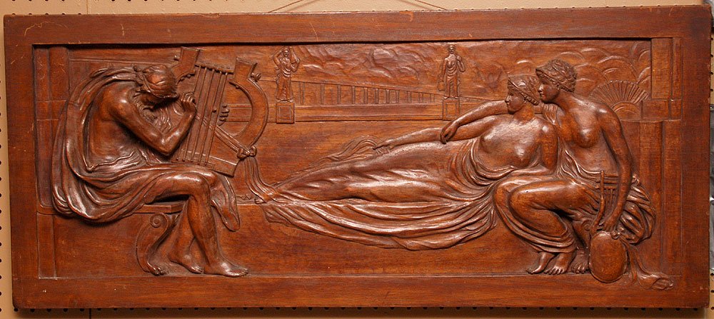 Lawrence Alma-Tadema (1836-1912 Dutch/British): Lawrence Alma-Tadema (1836-1912 Dutch/British) Attributed to. High Relief hand Sculpted & Carved Wood Plank (Paneel) of a Greco Roman Scene. The Carving Depicts two nude women lounging while listening