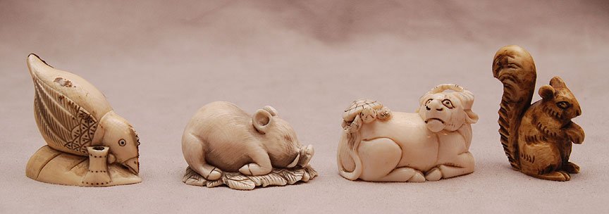 4 carved ivory netsukes: 4 carved ivory netsukes