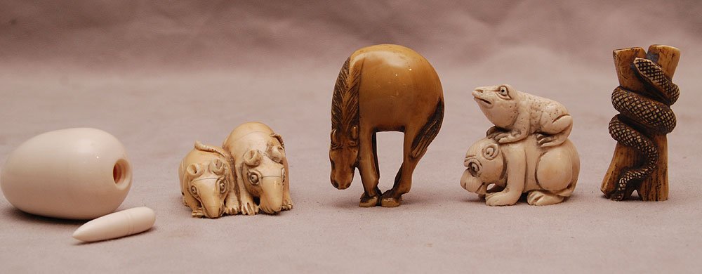 4 carved ivory netsukes and carved ivory container: 4 carved ivory netsukes and carved ivory container (2"h)