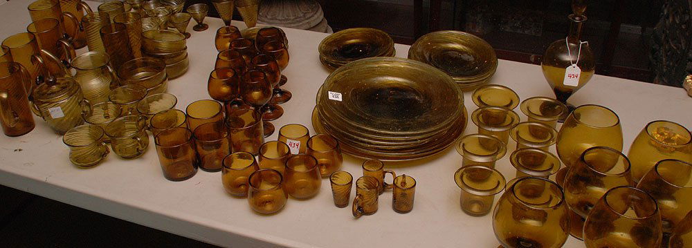 Very large set of Venetian hand blown amber color: Very large set of Venetian hand blown amber color glass, incl; 6 ice tea glasses, 6 sherbets, 2 wines, 4 waters, 1 pitcher, 1 covered sugar, 5 finger bowls, 5 cups, 7 saucers, 8 sherries, 5 juices, 6