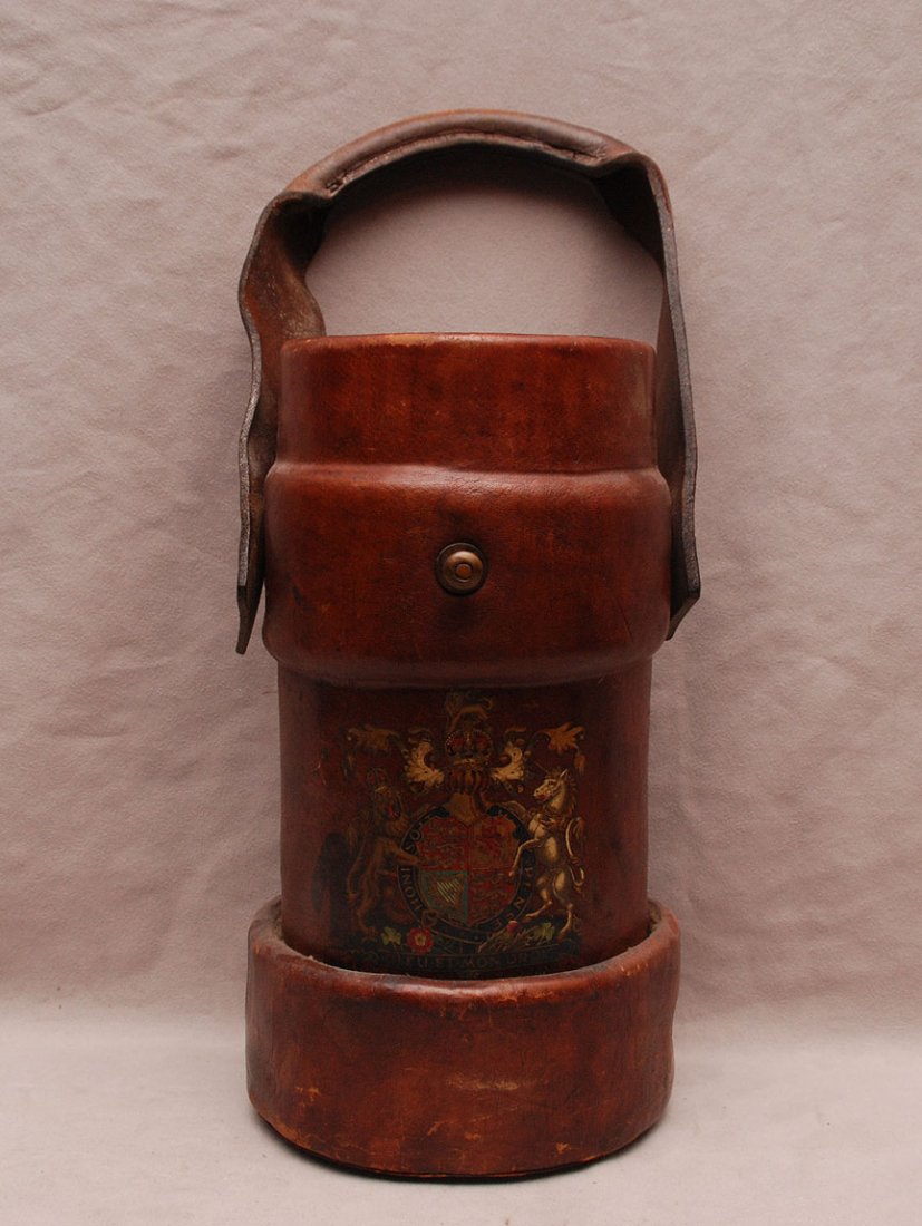 Reproduction leather fire bucket with Coat of Arms on: Reproduction leather fire bucket with Coat of Arms on front, English, B.H.G. Ltd. On bottom