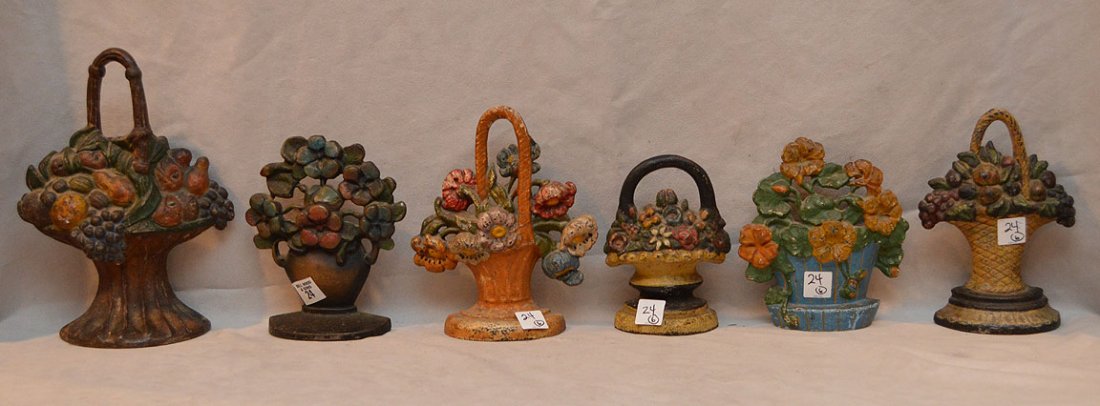 Lot of 6 antique painted doorstops, assorted sizes,: Lot of 6 antique painted doorstops, assorted sizes, floral and fruit motif