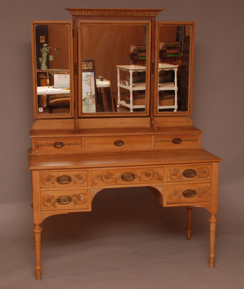 Pine step back ladies vanity with mirror, 3 drawers: Pine step back ladies vanity with mirror, 3 drawers under 3 panel mirror and 5 drawers in base, carvings and oval brass handles, 28"h (at mirror) x 47 1/2" w x 23" d