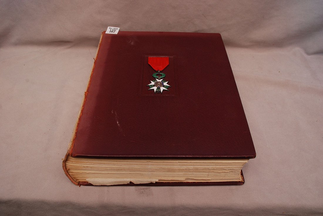 Antique book, "Creation de la legion D'honneur": Antique book, "Creation de la legion D'honneur" presented to Commanduer James Wood Johnson by President of The French Republic, Feb. 16, 1957, letters and photo included within, red leather with metal