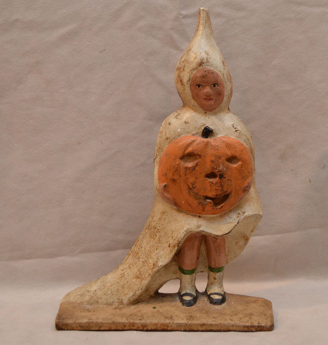 One figural doorstop goblin with pumpkin, 13"h x 9"w: One figural doorstop goblin with pumpkin, 13"h x 9"w