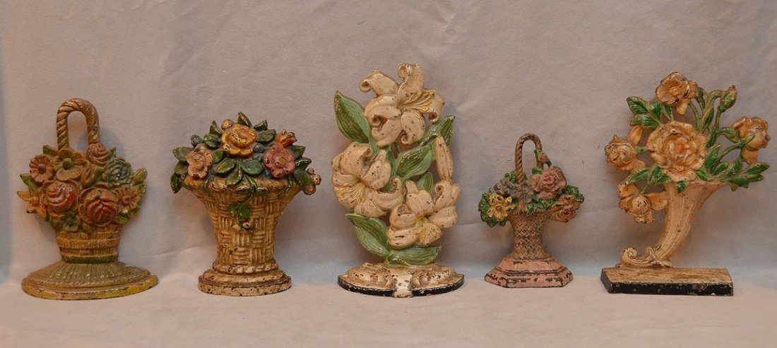 5 American floral motif iron doorstops: 5 American floral motif iron doorstops