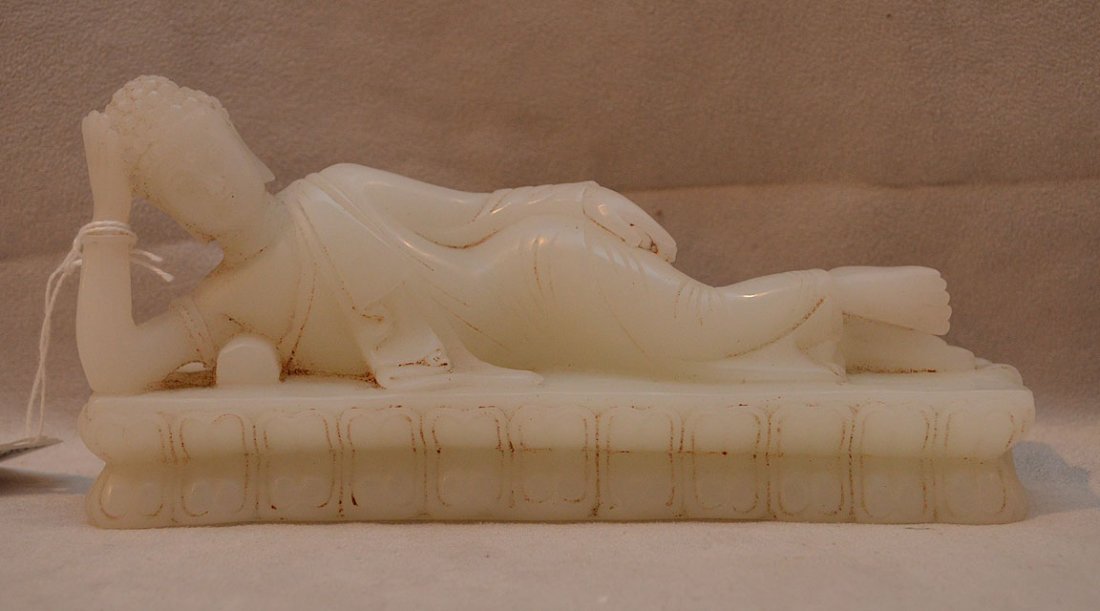 Fine Chinese White Jade Figure of a Buddha. The Deity: Fine Chinese White Jade Figure of a Buddha. The Deity Reclining on a Double Bed. 8 "L x 4" x 2 1/4". Very minor chip to base