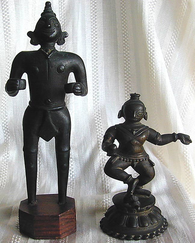 2 Antique Nepalese Folk Bronzes The first depicting a: 2 Antique Nepalese Folk Bronzes The first depicting a standing male figure on later carved octagonal wood base, bronze measures 8.25"H and with wood base total height is 9.75"H. The second depicting a