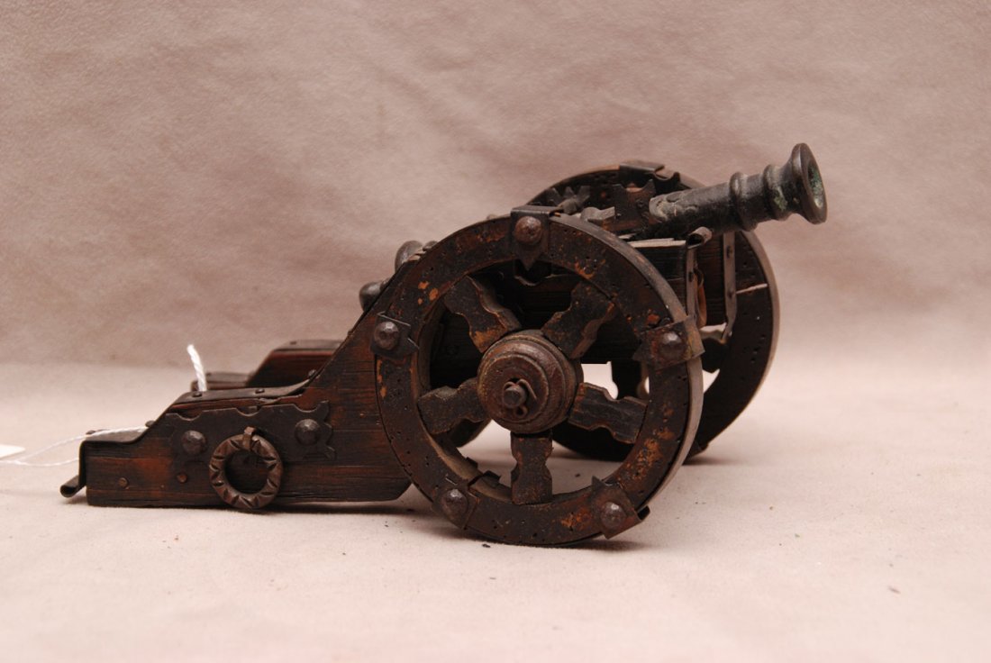 Antique Miniature Bronze & Wood Cannon. Condition:: Antique Miniature Bronze & Wood Cannon. Condition: very good for it's age. Lth. 8 1/2"