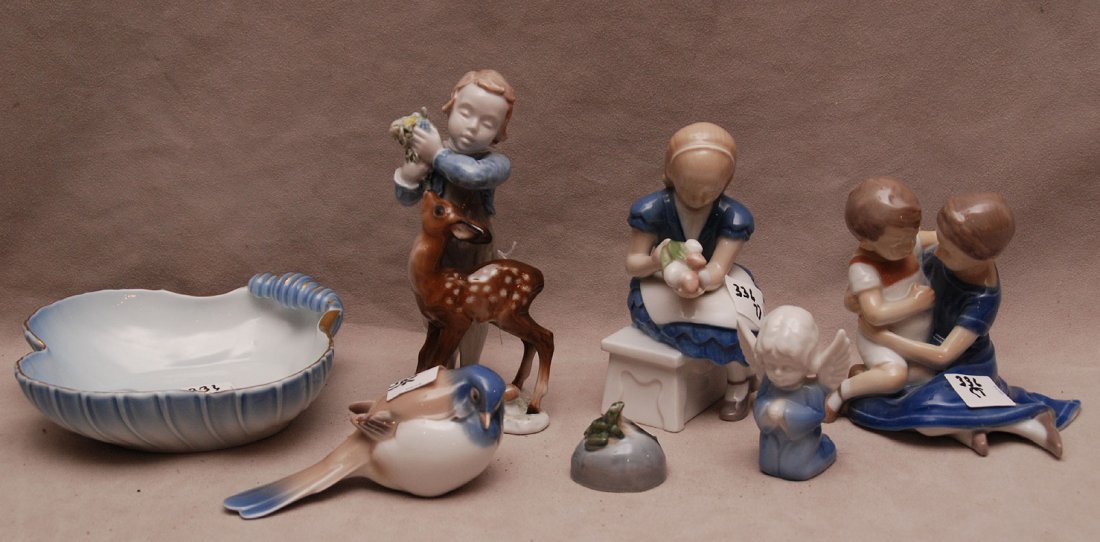 7 Denmark figurines, inc. B&G bowl 6 1/2 x 6 1/2; two: 7 Denmark figurines, inc. B&G bowl 6 1/2 x 6 1/2; two children 4 1/2H x 5"L ; B&G flower girl, 5 1/2"H x 3"L; B&G bird w/ nick, 5"L. Denmarked drilled angel 3"H; Royal Copenhagen frog 1 3/4"L x 1 1/4"