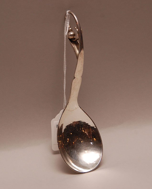 George Jensen Sterling Serving Spoon. Condition: very : George Jensen Sterling Serving Spoon. Condition: very good with conjoined monogram verso. Lth 6 3/4" 2oz Troy