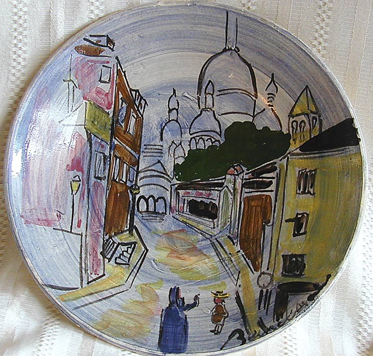 Ludwig Bemelmans (Amer 1898-1962) Ceramic Plate Titled : Ludwig Bemelmans (Amer 1898-1962) Ceramic Plate Titled "Montmartre", this hand-painted and glazed white ceramic plate by the renowned painter of the beloved childhood character Madeline was executed b