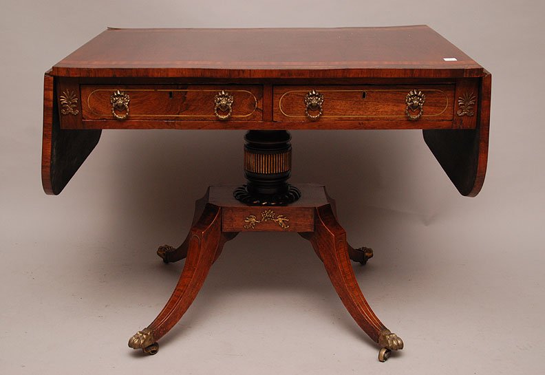 Georgian mahogany sofa table with banded inlay and drop: Georgian mahogany sofa table with banded inlay and drop ends, 2 faux drawers and 2 operating drawers on single pedestal leading to 4 downswept legs ending in brass paw caps, 28"h x 36" (24" with ends