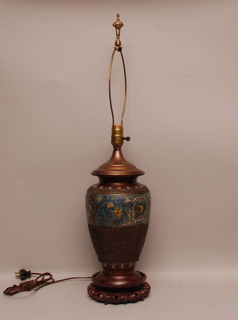 Champleve Porcelain Lamp with a carved wood base. Cond: Champleve Porcelain Lamp with a carved wood base. Condition: good. Ht. 16"