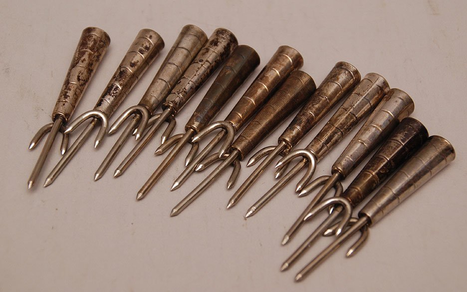 Set of 12 sterling handled corn holders: Set of 12 sterling handled corn holders