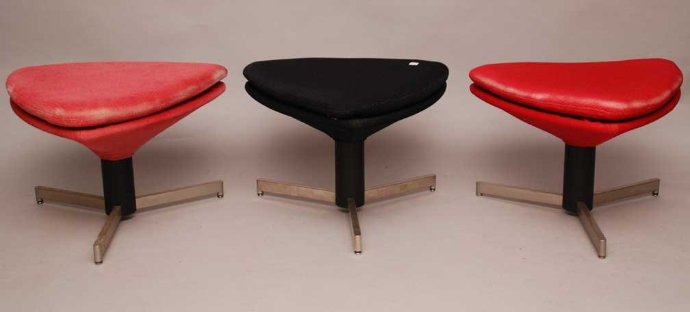 3 modern stools, 2 with worn red upholstery and 1 with : 3 modern stools, 2 with worn red upholstery and 1 with black upholstery