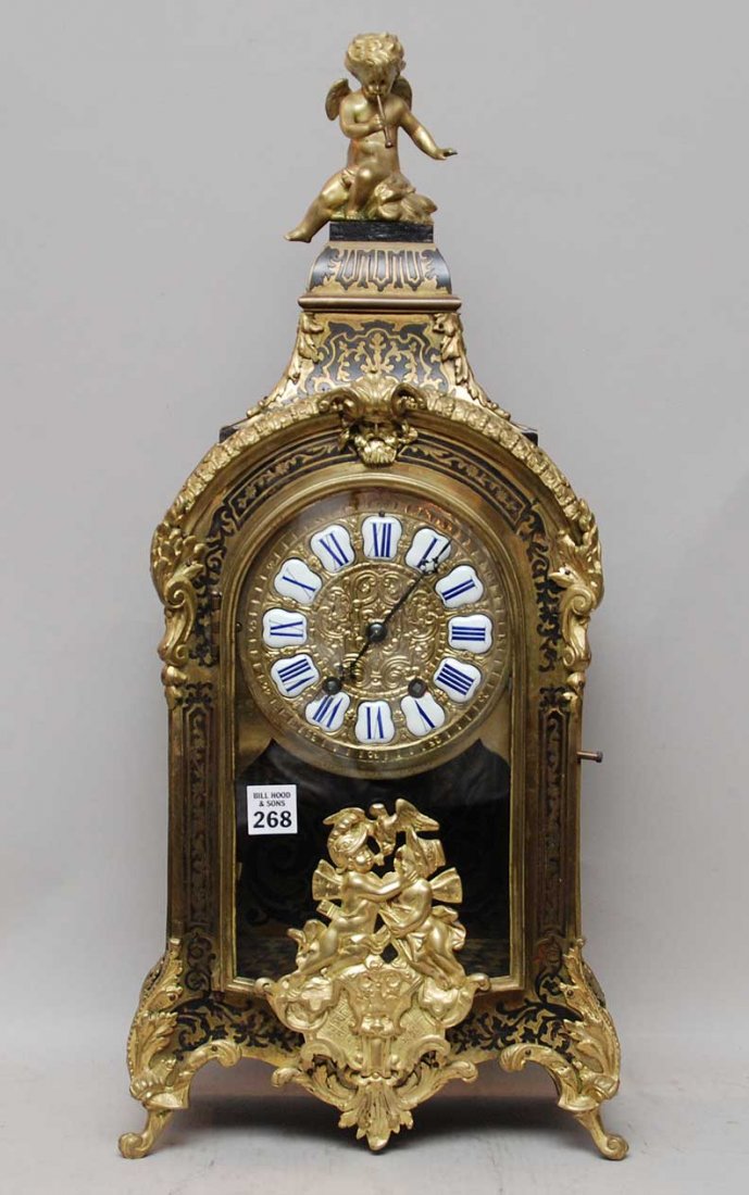 Antique French Boulle clock with bronze mounts, time an: Antique French Boulle clock with bronze mounts, time and strike movement, retailed by Black Starr & Frost, New York, 24"h x 10"w x 6"d (showing normal wear for its age)