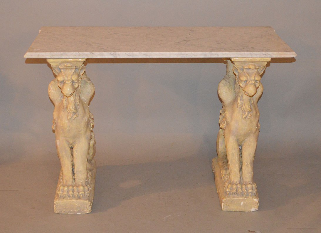 2 Consoles, 4 compostion/plaster griffins: 2 Consoles, 4 compostion/plaster griffins with non matching marble tops, griffins are 30" tall x 20" deep, marble tops are marriges and one is 6' x 1' & one is 47" x 21"
