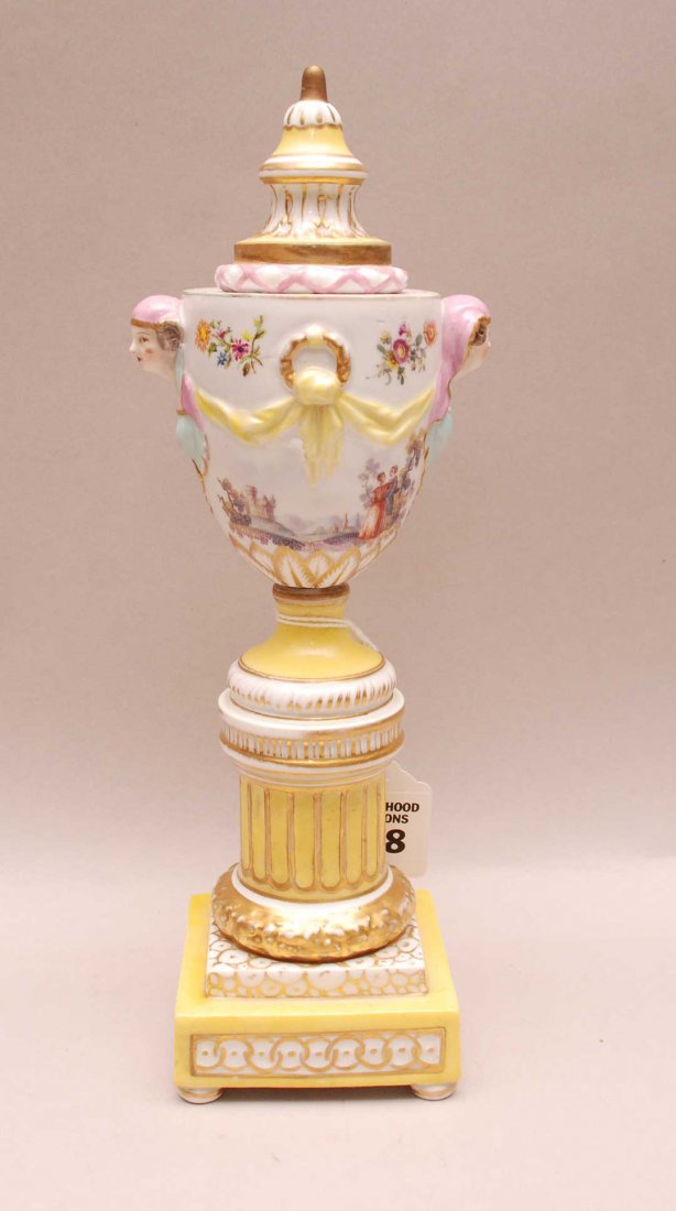 Antique KPM Urn / Candlestick. The top of the urn: Antique KPM Urn / Candlestick. The top of the urn reverses to become a candlestick. Condition: good with old professional restoration. Ht. 10 3/4"