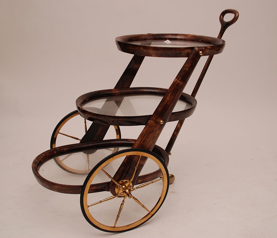 3 tier tea wagon tortoise style 35"h: 3 Tier Skin/Leather Cart. Condition: good with minor normal wear. 35"h