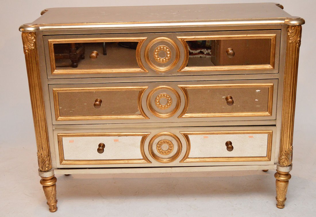 Silvered and gilded 3 drawer chest of drawers with: Silvered and gilded 3 drawer chest of drawers with mirrored fronts, 35"h x 45"w x 18"d (marks on top)