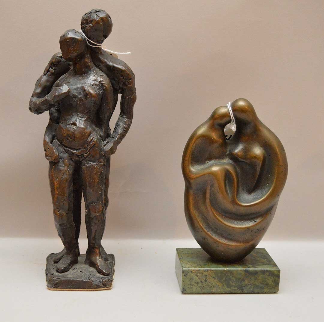2 bronze sculptures, one of couple embracing on (1 of 3)