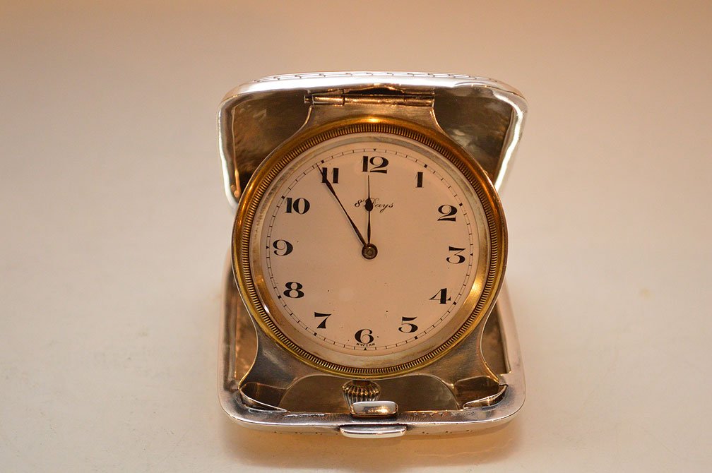 Hand Hammered Sterling Travel Clock.  Condition: good. (1 of 5)