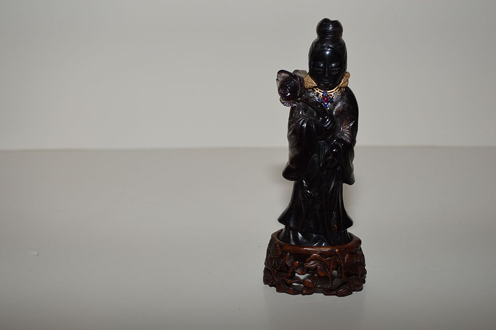 Chinese Amethyst Quan Yin Carving with a 14K gold and: Chinese Amethyst Quan Yin Carving with a 14K gold and jeweled necklace. Ht. 6 1/2" including the wood stand.