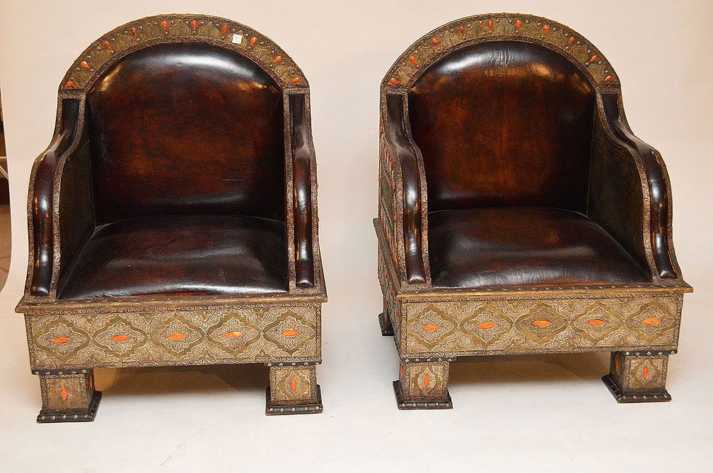 Pair Turkish leather and hammered metal arm chairs with: Pair Turkish leather and hammered metal arm chairs with coral colored stones applied, 39 1/2"h x 30"w x 25 1/2"d