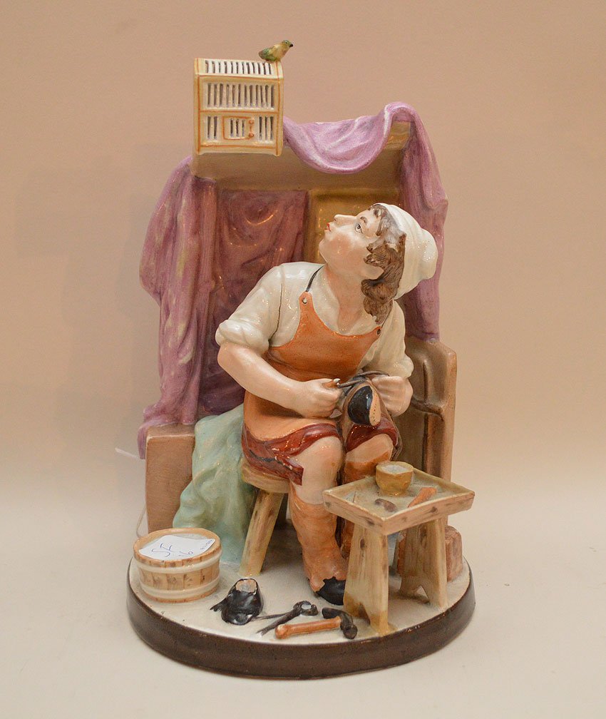 Continental Porcelain Group depicting a shoe maker. (1 of 6)