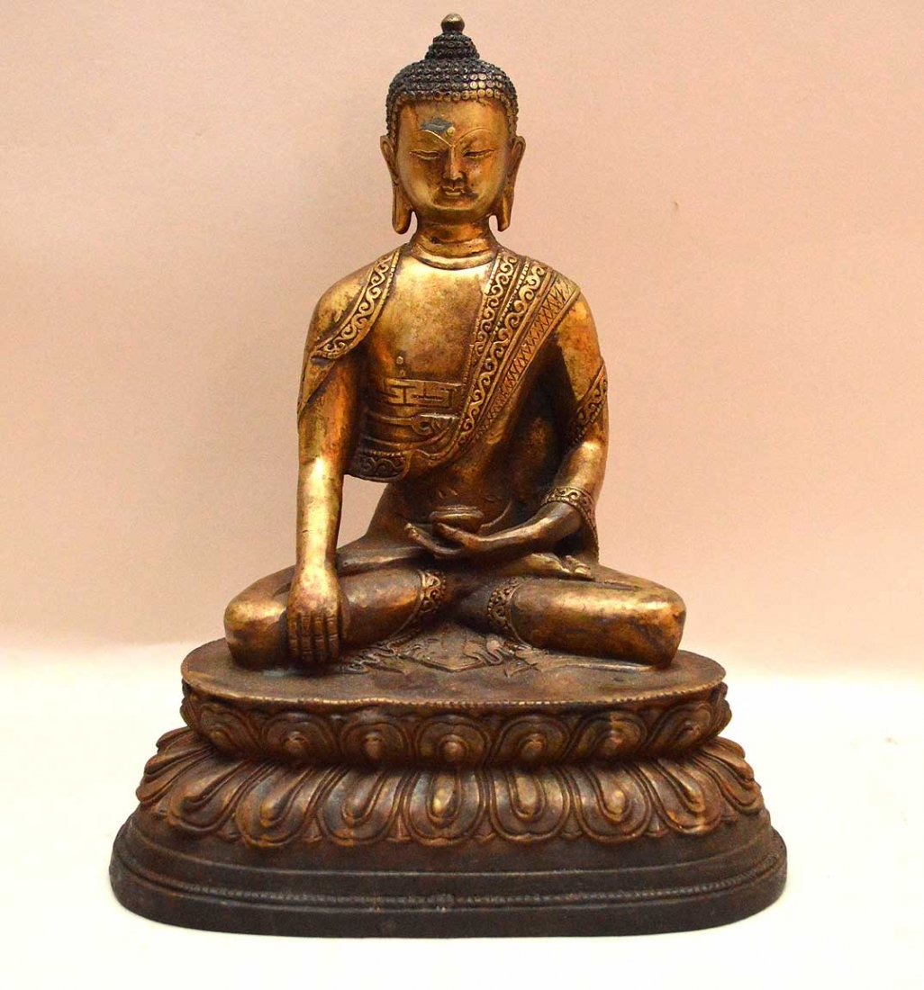 Sino-Tibetan Gilded Cast Figure of Buddha, seated in a (1 of 4)