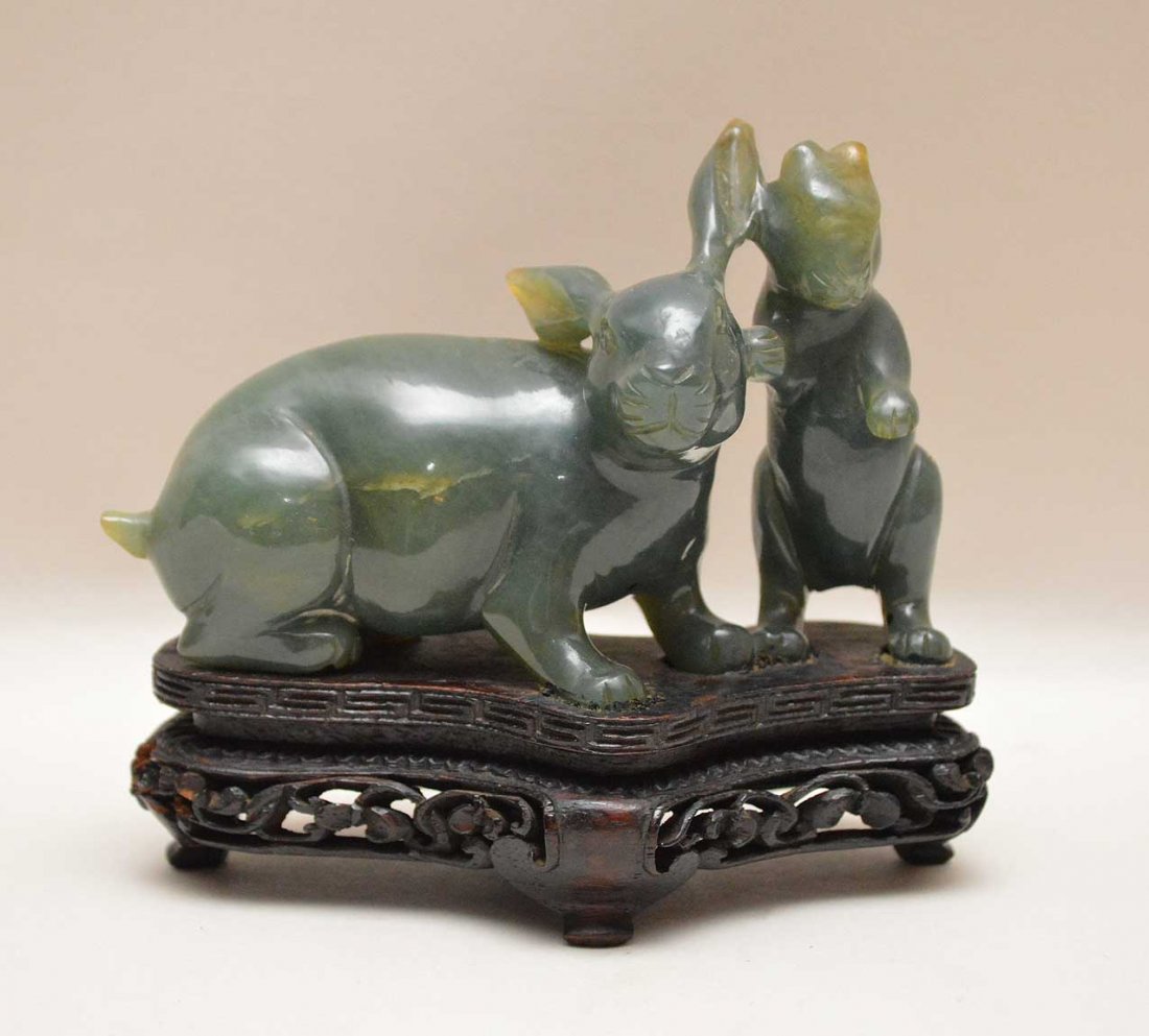 Carved Jade Group Two Rabbits on a carved wood base. (1 of 3)