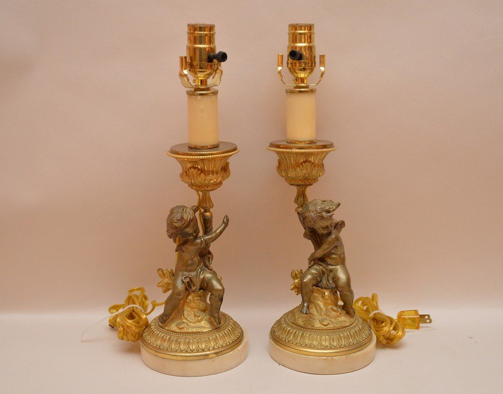 Pair Continental bronze figures of a seated putti, 19th (1 of 7)