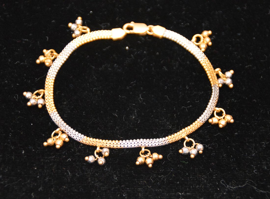 22 kt yellow & white gold bracelet, 9.8 grams: 22 kt yellow & white gold bracelet, 9.8 grams