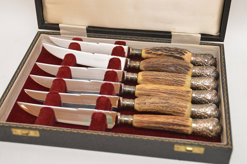 6 ornate silver tipped horn steak knives in original (1 of 2)