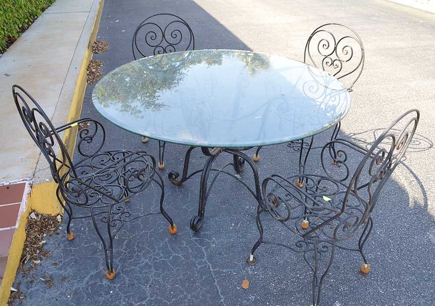 5 pc. Patio set, table base rusted with tassel motif, (1 of 3)
