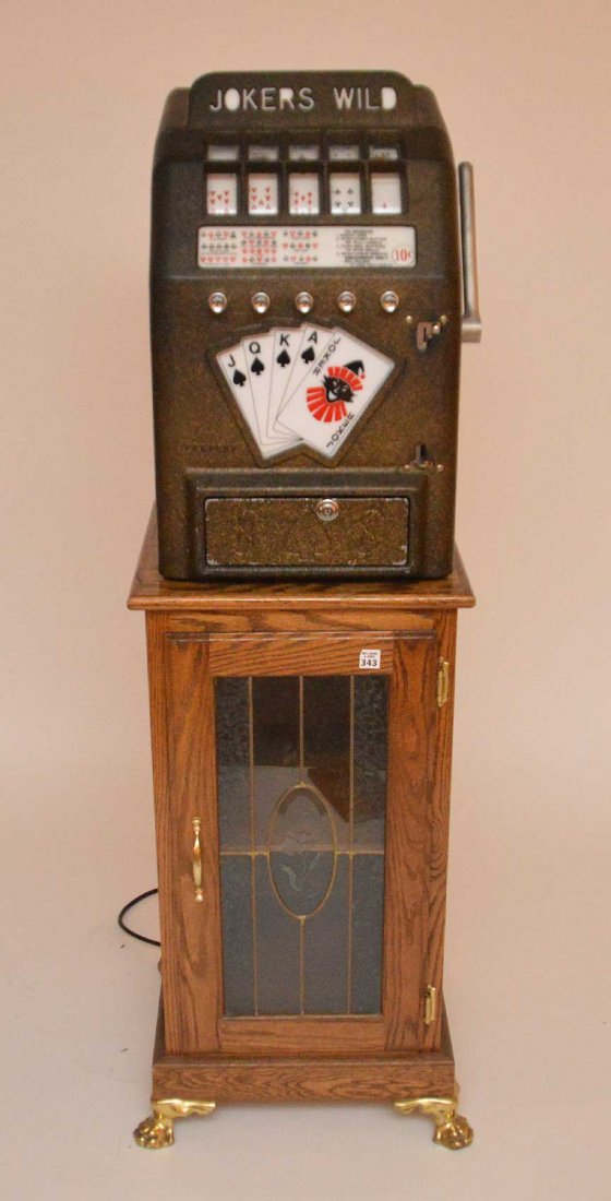 Jokers Wild Trade Simulator on oak cabinet (1 of 6)