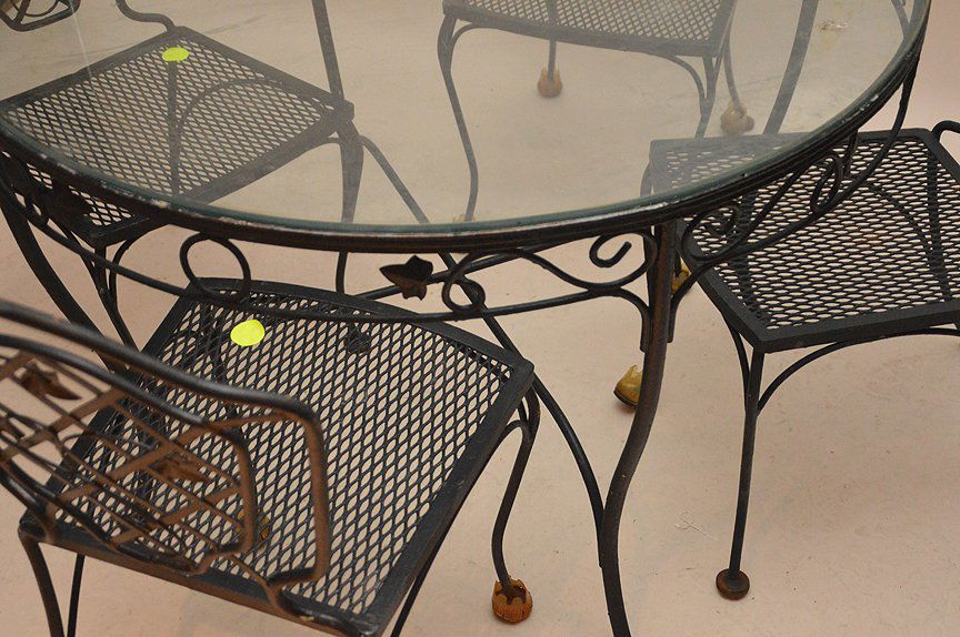 Black acorn motif patio table and 4 chairs: Black acorn motif patio table and 4 chairs