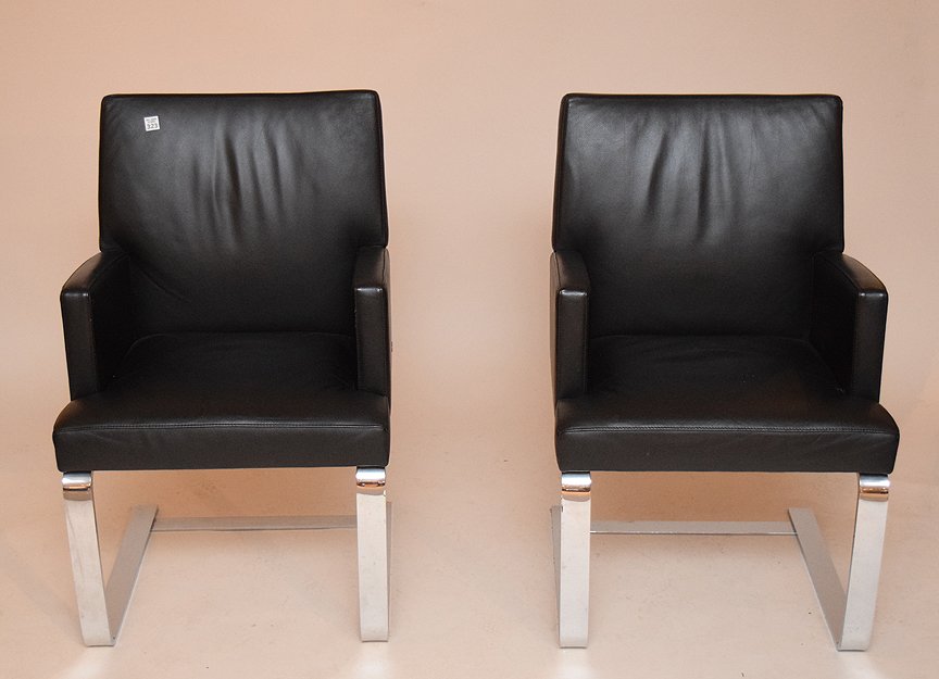 Superior quality pair of Modern black leather and: Superior quality pair of Modern black leather and chrome De Sede of Switzerland armchairs. Designed by Peter Maly and Birgit Hoffmann for de Sede, 35 inches tall x 22 inches wide