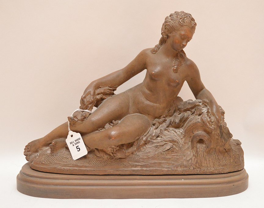 Antique French Terra Cotta Sculpture of a reclining: Antique French Terra Cotta Sculpture of a reclining nude maiden with a wood base. Ht. 11" W. 15" D. 5"
