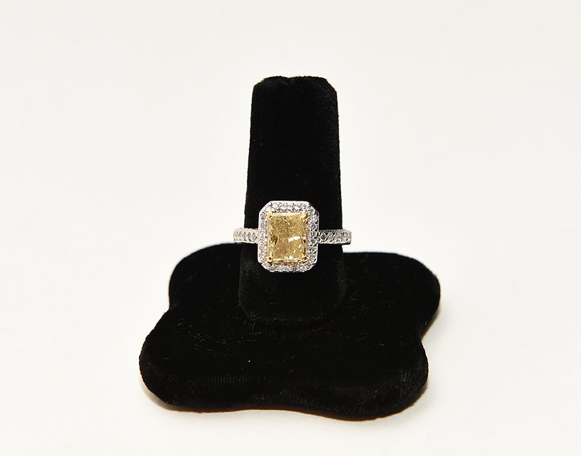 Ladies platinum ring containing a princess cut natural (1 of 7)