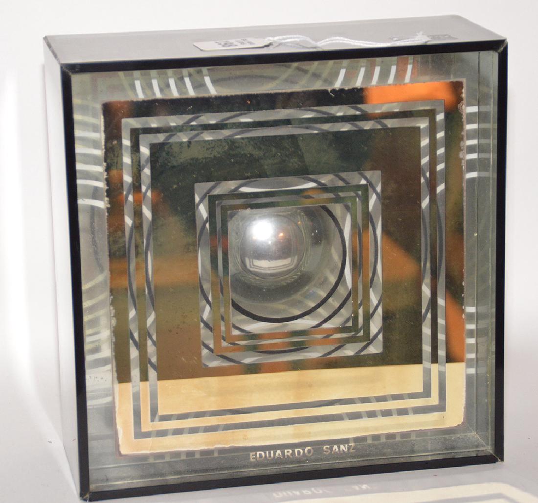 EDUARDO SANZ (SPANISH, B.1928), GLASS & ALUMINUM FRAMED: EDUARDO SANZ (SPANISH, B.1928), GLASS & ALUMINUM FRAMED ABSTRACT. Ht. 10" W. 10" D. 4". With gallery and artist provenance on the back.