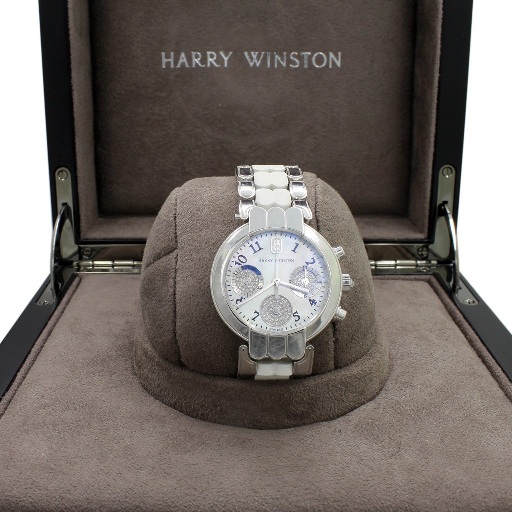 Harry Winston 18 K Gold Diamond Watch: 18 K Gold Diamond Watch by Harry Winston in Original Box Quartz Movement Swiss Made, 032534, No. 2163, 200UCQ32W.