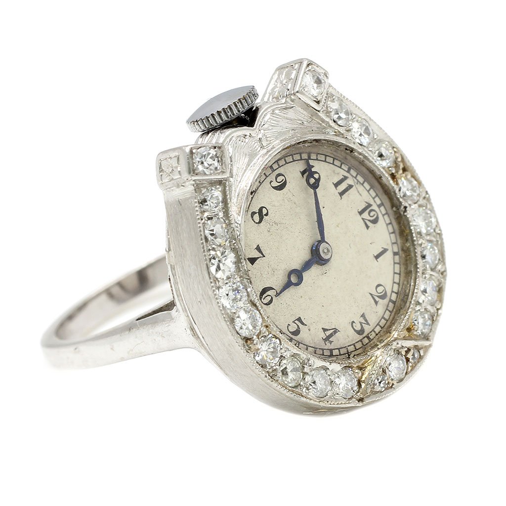 Audemars Piguet, Diamond Watch Ring: Signed Audemars Piguet Swiss Diamond approx. 0.75 ct total Mounting Platinum and 14k Gold Ring Size 6.75 Total Weight 18 g Circa 1920 Tested by watchmaker and is currently functional. Long term precis