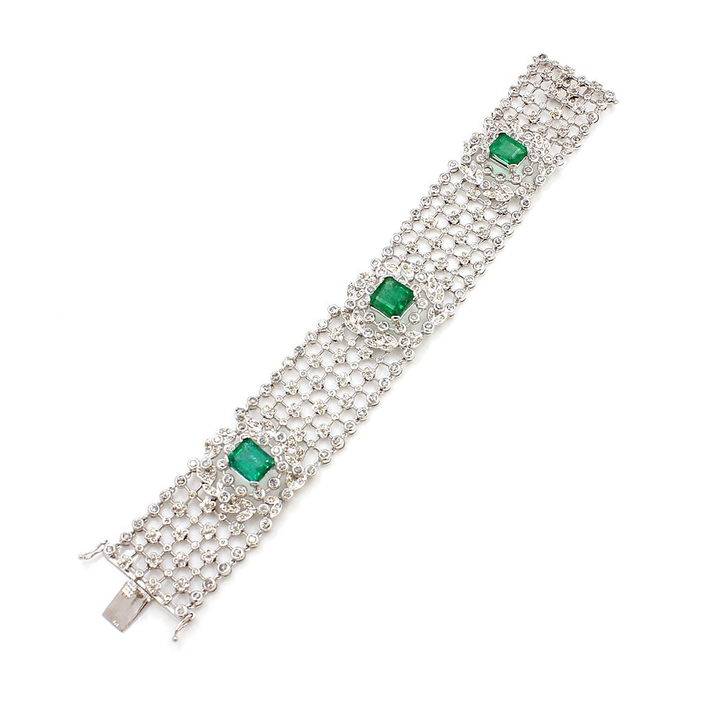18k Gold, Emerald & Diamond Bracelet: 18k Gold, Emerald & Diamond Bracelet Emerald 1: 9.35mm x 7.48mm x 5.42 mm Emerald 2: 9mm x 8.4mm x 5.2 mm Emerald 3: 8.97mm x 7.04mm x 5.15mm Diamonds approx. 5 ct total Mounting: 18k Gold Length: 7"