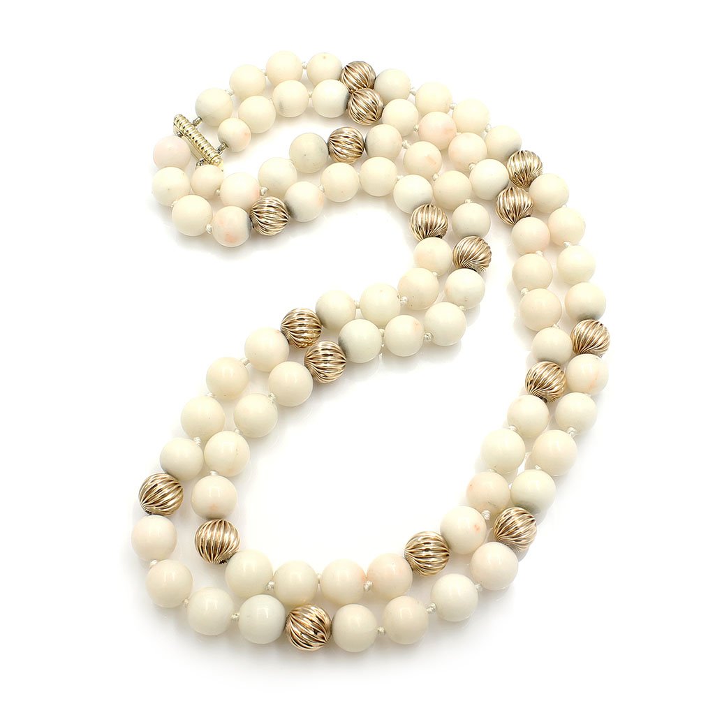 Van Cleef & Arpels Gold & Coral Necklace: Van Cleef & Arpels Gold & Angel Skin Coral Bead Necklace Signed VC&A Coral approx. 10.15 mm Length: 20" Total Weight: 130.8 g.