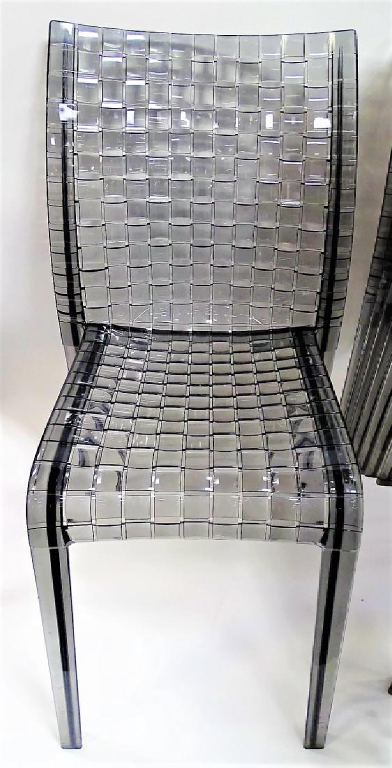 8 MODERN KARTELL 'AMI AMI' GHOST CHAIRS: Eight Tokujin Yoshioka for Kartell 'Ami Ami' ghost chairs. Composed of Polycarbonate, in smoke color, of a woven design. Made in Italy, circa 1999. Marked to back edge. Measures approx. 32-1/2"H x 15-